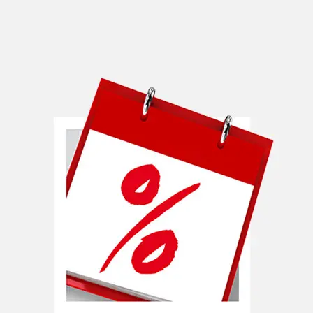 Een close-up van een kalender met een opvallend rood percentagesymbool op de voorkant. Een close-up van een kalender met een opvallend rood percentagesymbool op de voorkant.